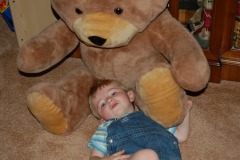 Alexander chilling with a big bear!