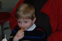 Alexander munching on a French toast stick...