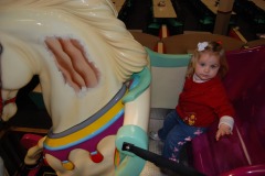 Katie riding the big pony!
