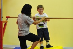 Alex on the uneven bars...