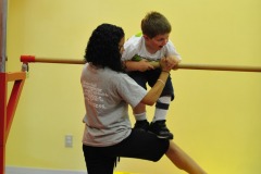 Alex on the uneven bars...