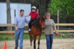 Interesting technique of holding the reins...