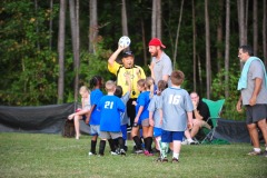 Poor Coach Charles getting mobbed for the ball...