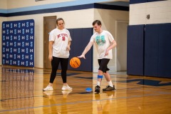 Dribbling the ball with Miss Emma!