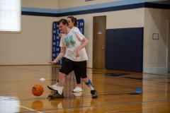 Dribbling the ball with Miss Emma!
