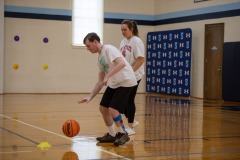 Dribbling the ball with Miss Emma!