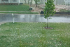 Quarter-sized hail (front yard!)