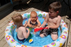 Three happy kids in the pool!