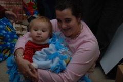 Katie getting a bit of a cuddle from Meghann...