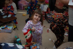 Mairin goes digging for presents in the stocking...