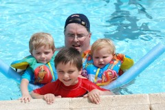 Daddy and an arm full of kids...