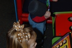 Katie talks and Alex is ready to whack a mole!