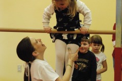 Katie doing a great job on the uneven bars...