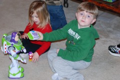 Alexander and Katie playing with Buzz Lightyear...