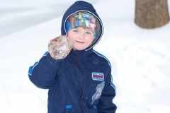 Alexander with a small snowball...
