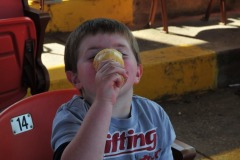 The boy really loves his cone!