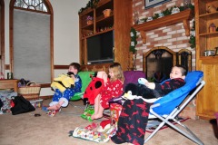 The kids enjoying their new chairs and pillow pets...