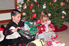 Nicholas and Katie opening gifts...