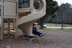 Alex enjoying the slide at the park...
