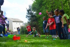 Alex does the ball toss...