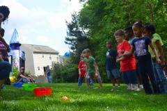 Alex does the ball toss...