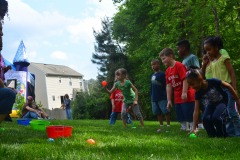 Alex does the ball toss...