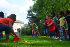 Alex does the ball toss...