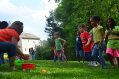 Alex does the ball toss...
