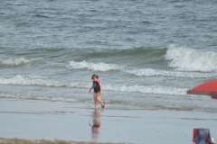 Katie frolicking in the surf...