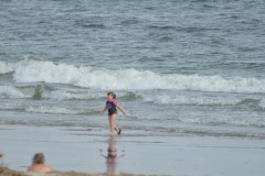 Katie frolicking in the surf...