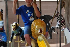 Enjoying a turn on the carousel...