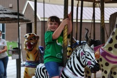 Enjoying a turn on the carousel...