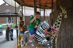 Enjoying a turn on the carousel...