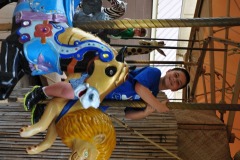 Enjoying a turn on the carousel...