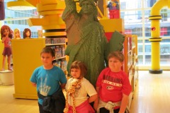 Kids with the Statue of Liberty in Legos...