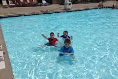 Three kids in the pool...