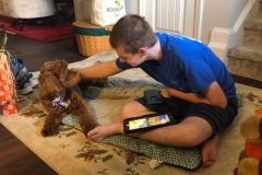Mistletoe and Alex and his iPad