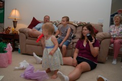 The Ryans and Grandma Carol watch the tissue paper fly...