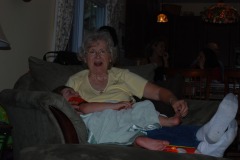 Now she's going for his toes!  <B>SO</B> not fair!