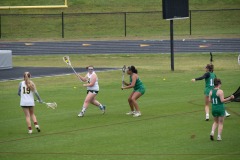 Katie with the ball considering her options...