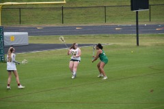Katie with the ball considering her options...