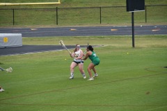 Katie with the ball considering her options...