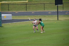 Katie with the ball considering her options...