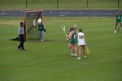 Referee re-positions her for a lateral free position...