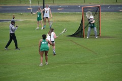 Referee re-positions her for a lateral free position...