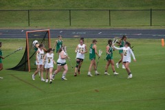Celebrating the goal and the triumphant walk back to the line