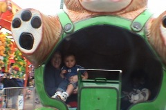 Nicholas and Mommy in the bear ride Nicholas and Mommy in the bear ride