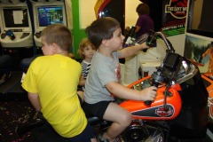 Nicholas and Hardy riding the motorcycle...