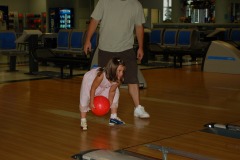 The birthday girl is going for accuracy...