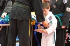 He's promoted to blue belt!